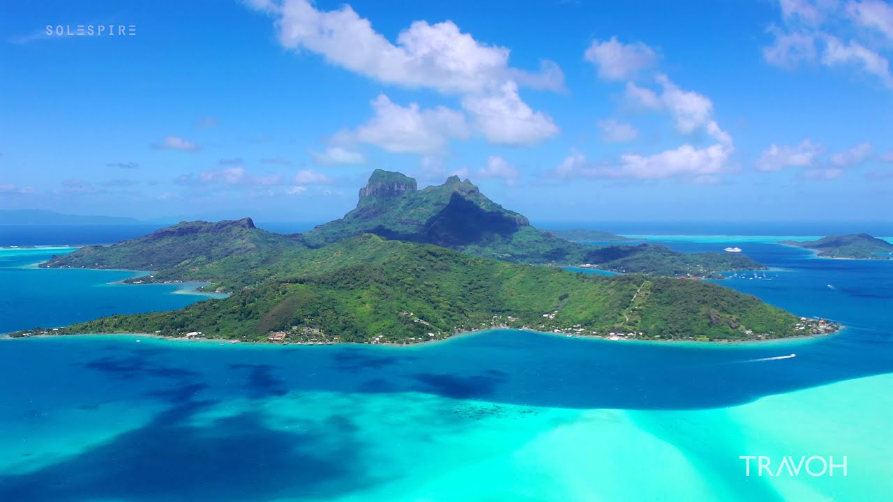 Rising View of Bora Bora Amazing Drone Aerial Ascent Motu Tane