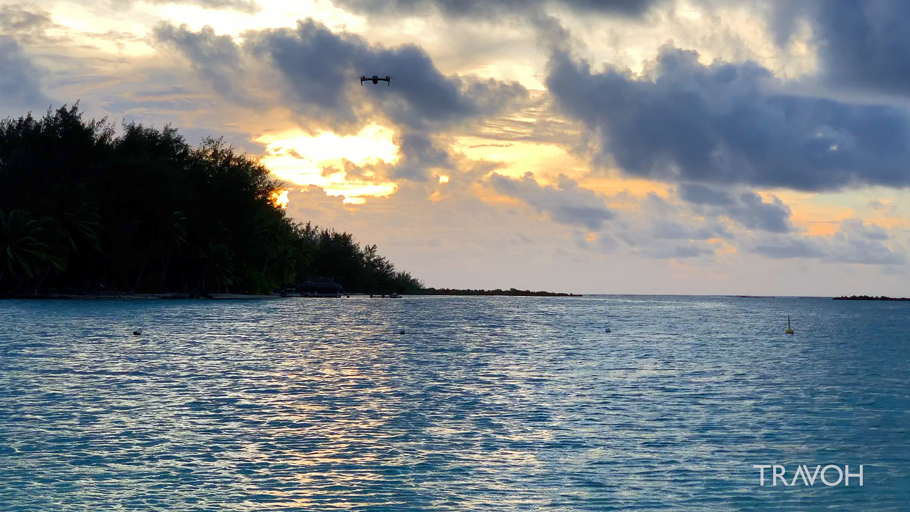 Drone Flying at Sunset - Blue Heaven Island - Motu Paahi - Bora Bora, French Polynesia - 4K Travel Video