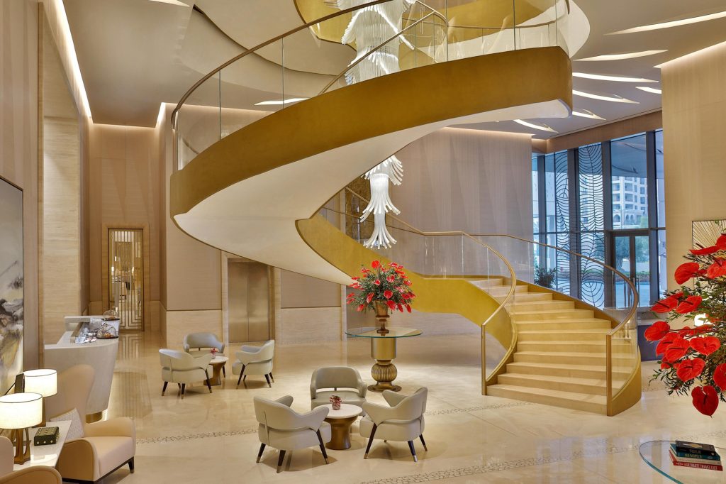 The St. Regis Dubai The Palm Jumeirah Hotel - Dubai, UAE - Lobby Grand Staircase and Chandelier