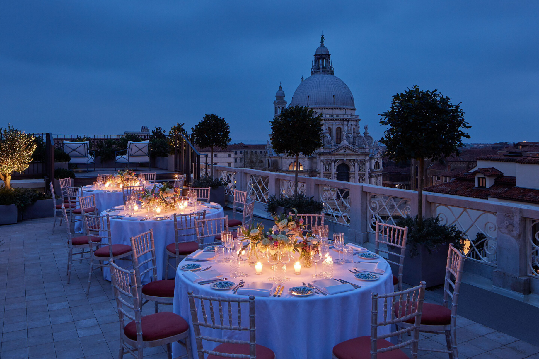 The St. Regis Venice Hotel – Venice, Italy – The Santa Maria Suite Terrace Outdoor Social Setting at Night