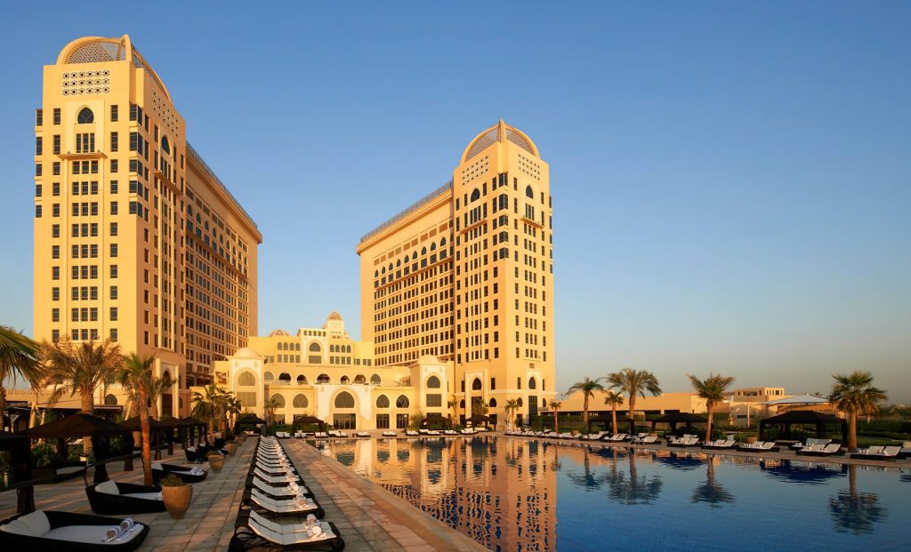 The St. Regis Doha Hotel - Doha, Qatar - Pool View at Dusk
