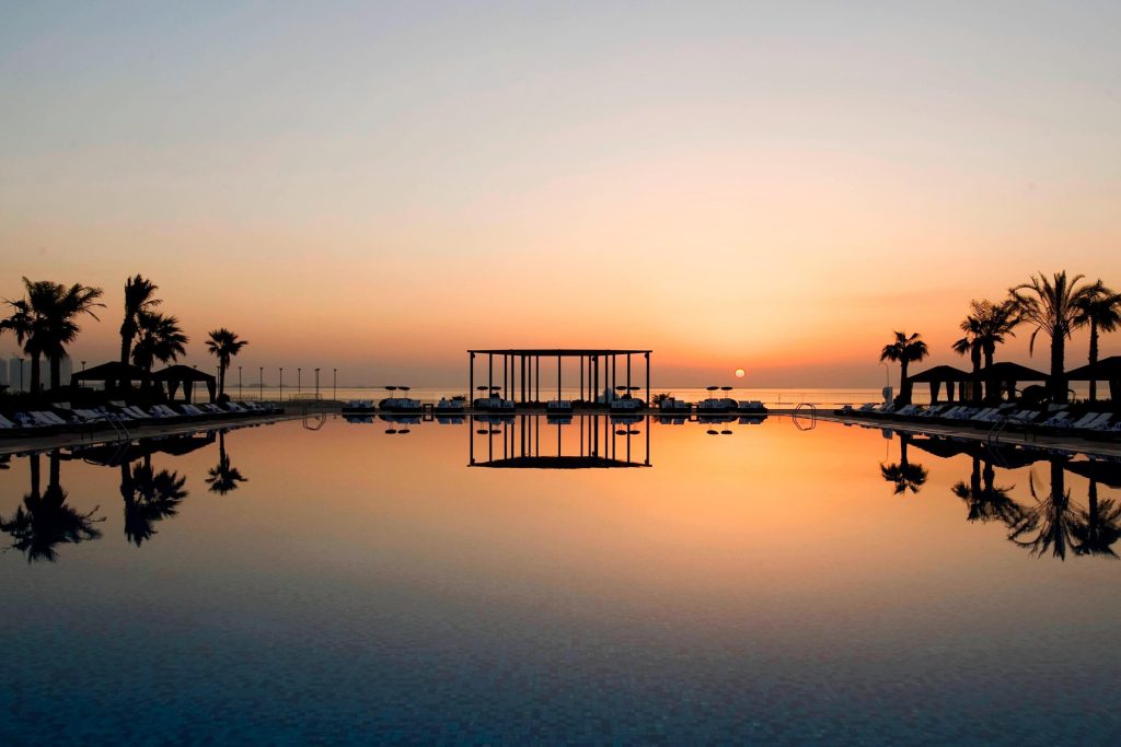 The St. Regis Doha Hotel - Doha, Qatar - Outdoor Pool Sunset