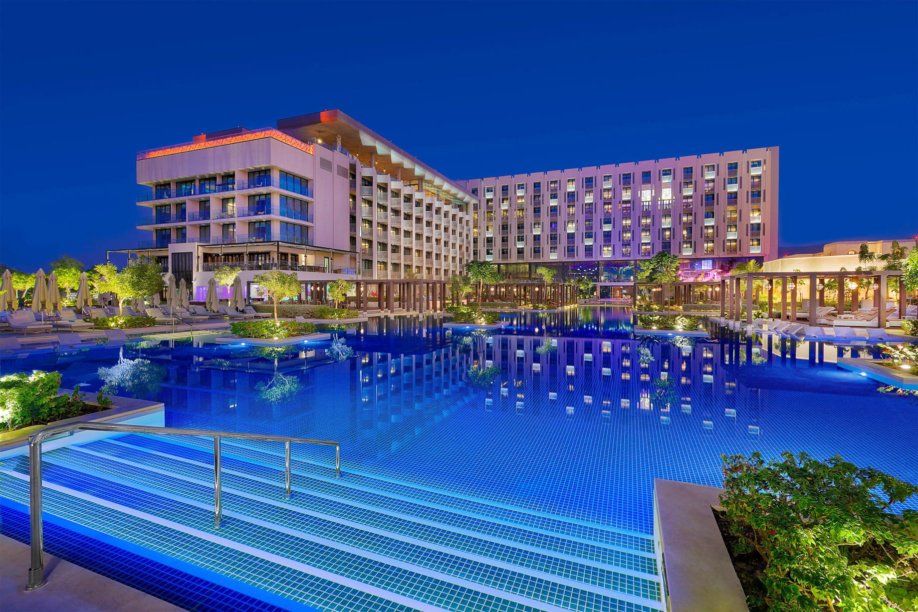 W Muscat Resort - Muscat, Oman - Exterior Swimming Pool Night