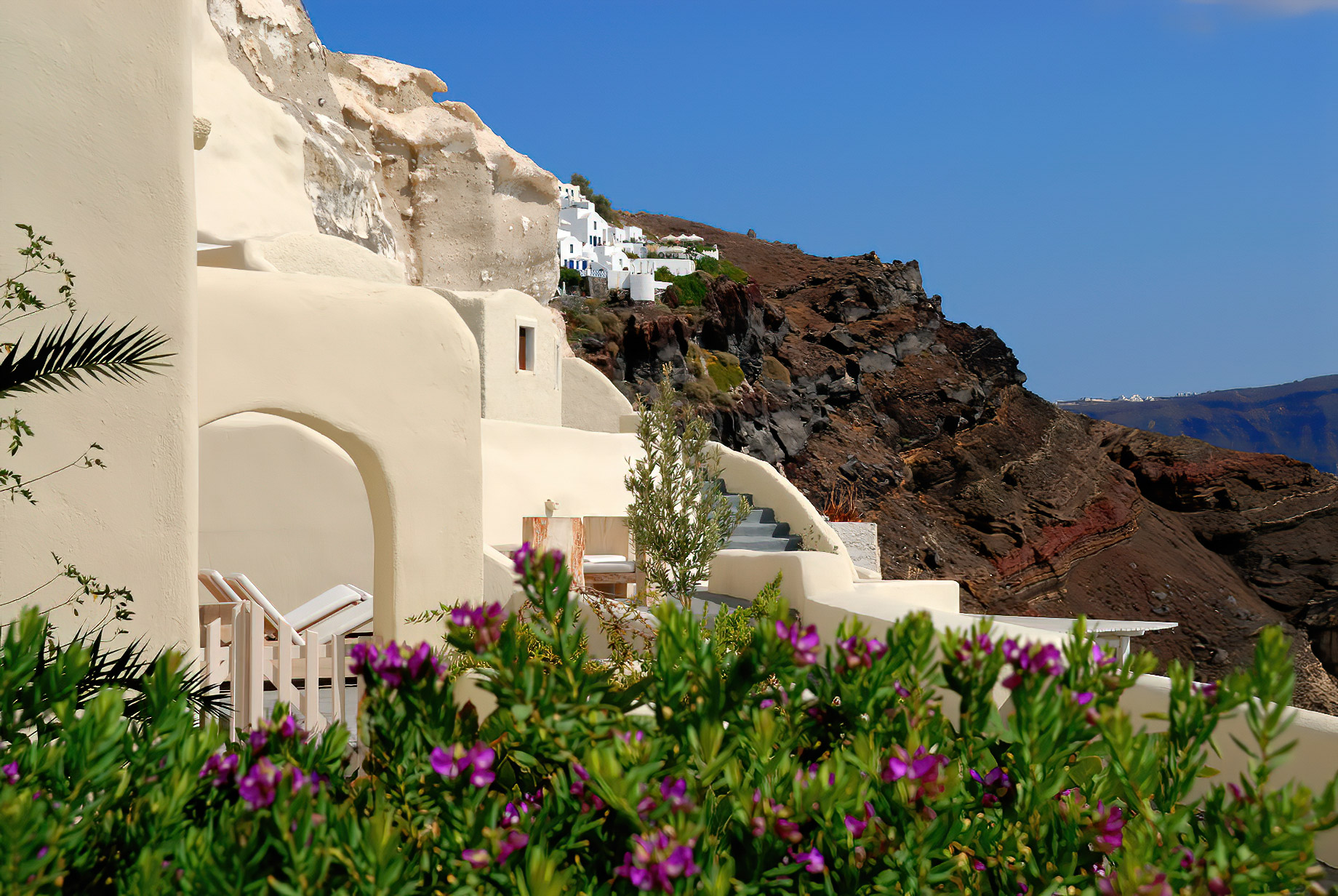 Mystique Hotel Santorini – Oia, Santorini Island, Greece – Balcony Hillside View