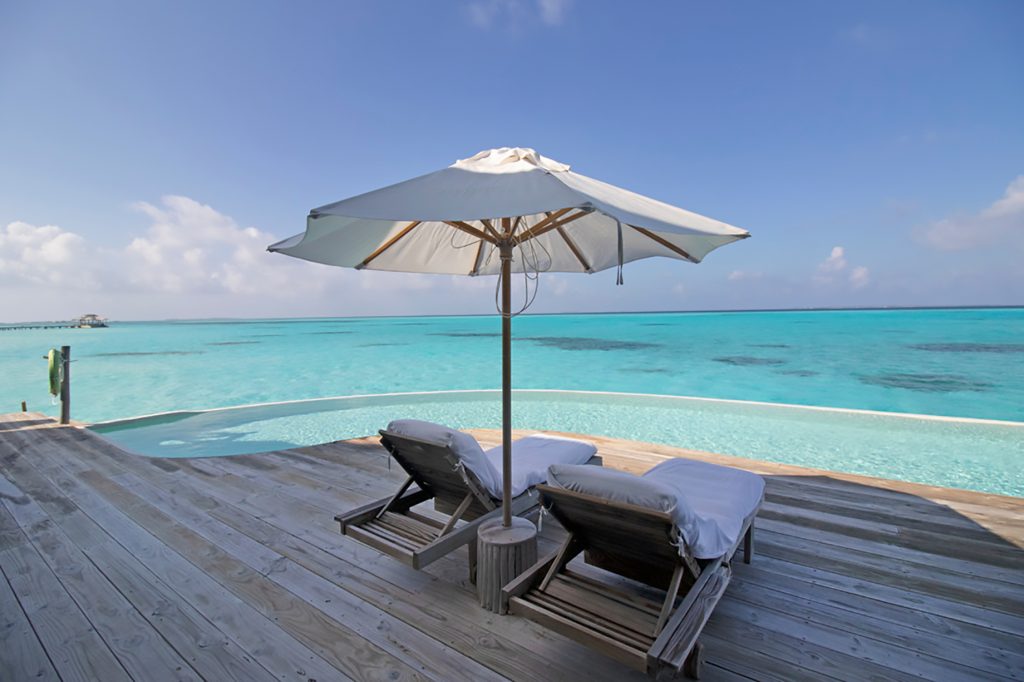 Soneva Jani Resort - Noonu Atoll, Medhufaru, Maldives - 4 Bedroom Water Reserve Villa Infinity Pool Deck Chairs