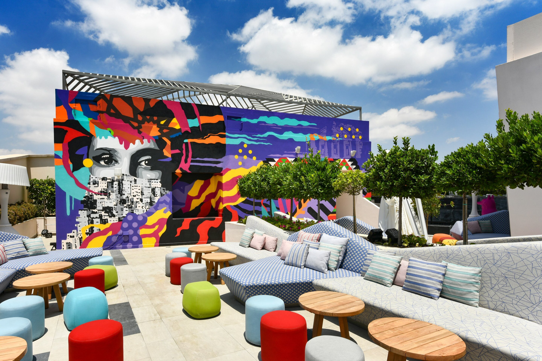 W Amman Hotel – Amman, Jordan – Dina Saadi Mural Outdoor Lounge