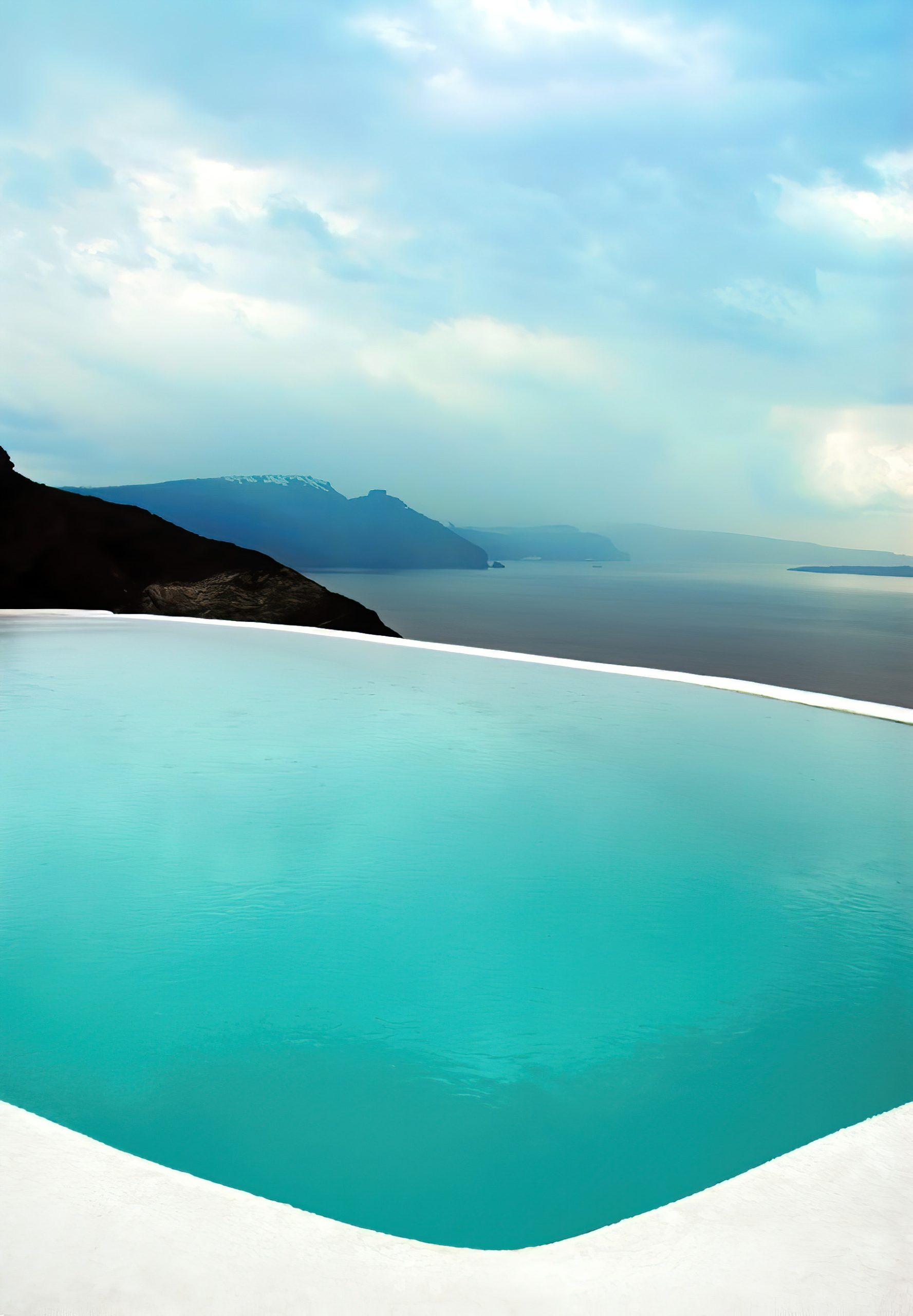 Mystique Hotel Santorini – Oia, Santorini Island, Greece – Clifftop Infinity Pool View