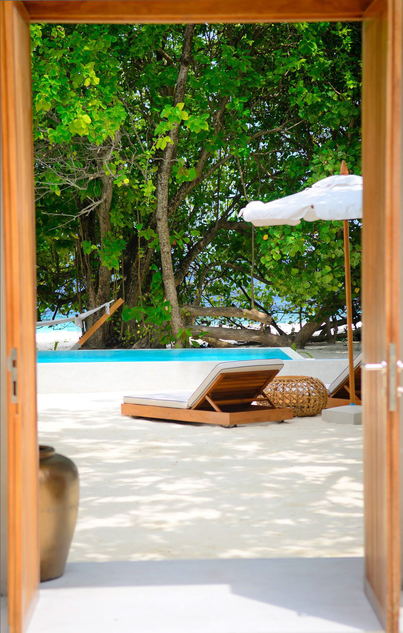 Amilla Fushi Resort and Residences – Baa Atoll, Maldives – Ocean Beach House Outdoor Poolside Lounge