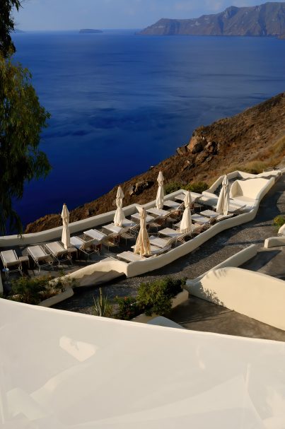 Mystique Hotel Santorini – Oia, Santorini Island, Greece - Ocean View Pool Deck Patio Chairs