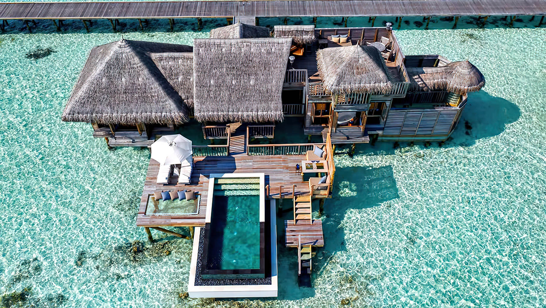 Gili Lankanfushi Resort – North Male Atoll, Maldives – Overwater Villa Infinity Pool Aerial View