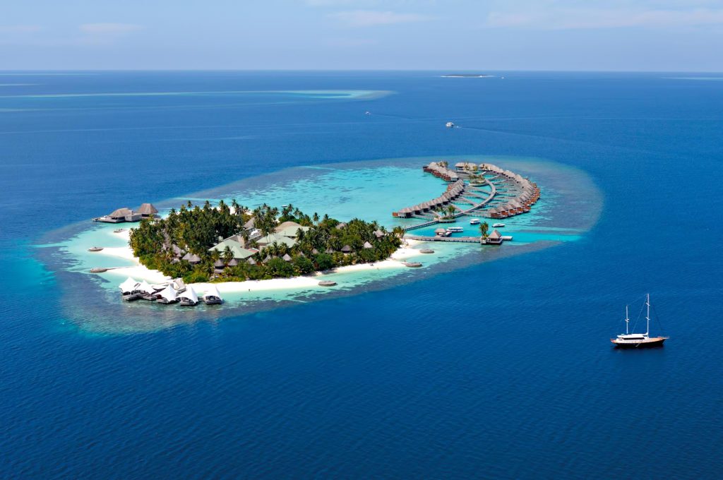 059 - W Maldives Resort - Fesdu Island, Maldives - Resort Aerial Sailboat Departure