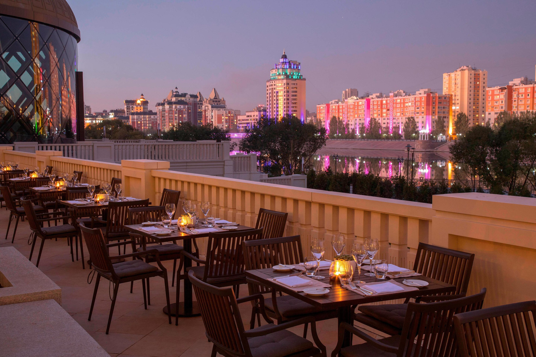 The St. Regis Astana Hotel – Astana, Kazakhstan – Exterior Terrace Tables Night