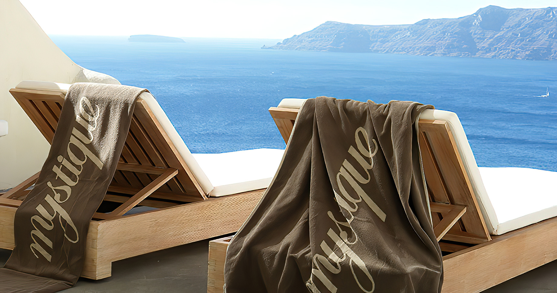 Mystique Hotel Santorini – Oia, Santorini Island, Greece – Clifftop Ocean View Deck Lounge Chairs