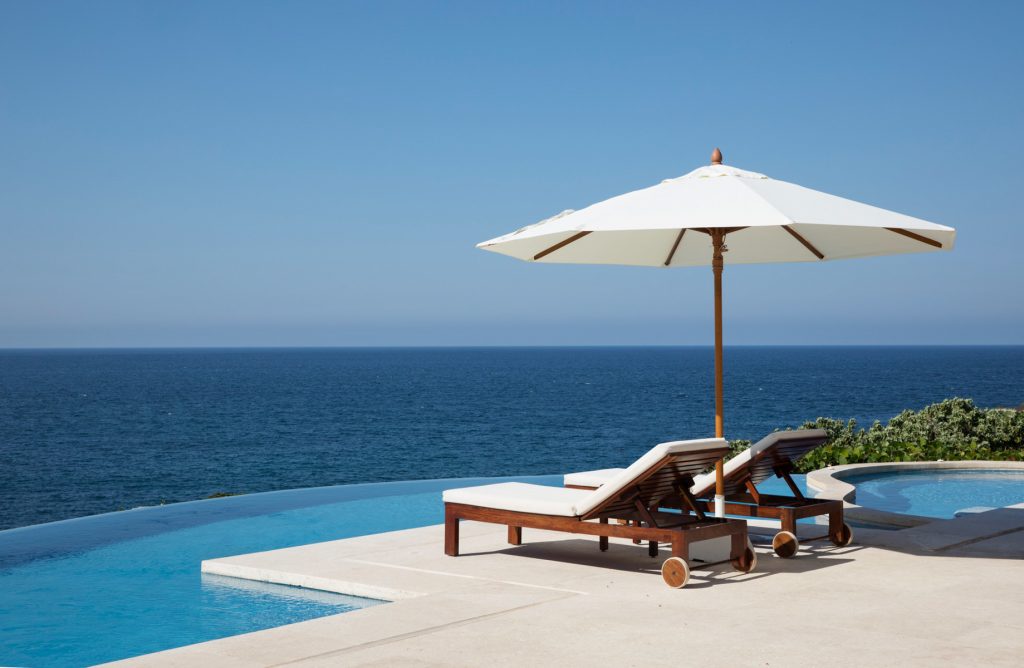 Four Seasons Resort Punta Mita - Nayarit, Mexico - Cielo Oceanfront Villa Pool Deck Lounge Chairs and Umbrella