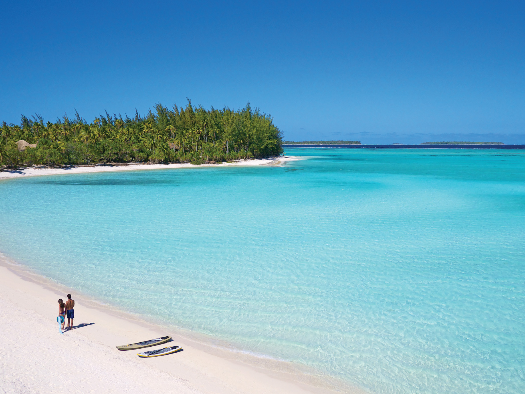 The Brando Resort - Tetiaroa Private Island, French Polynesia - Couple Walking on Beach