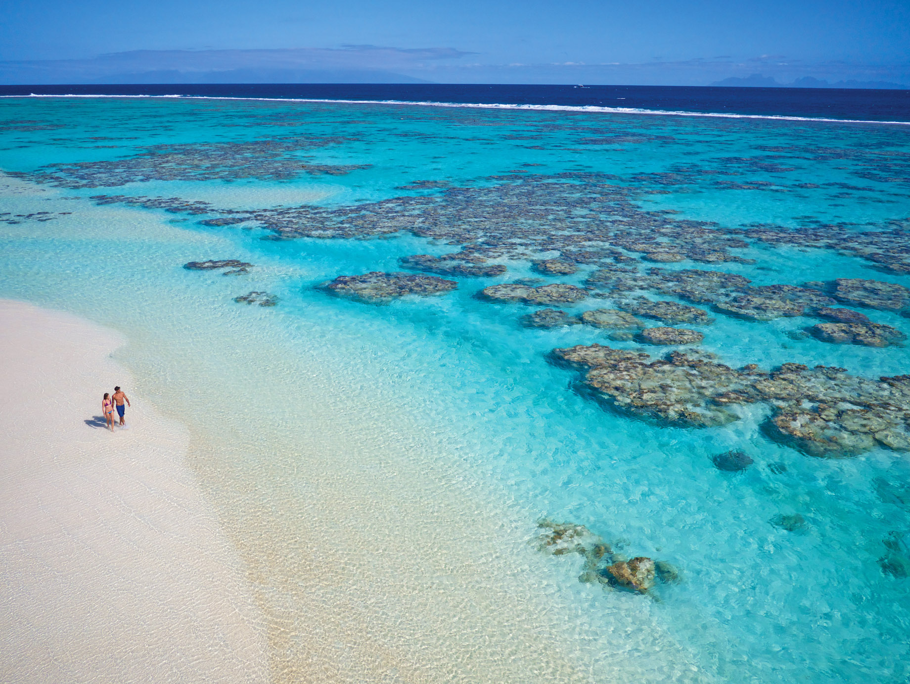The Brando Resort – Tetiaroa Private Island, French Polynesia – Couple Walking on Beach