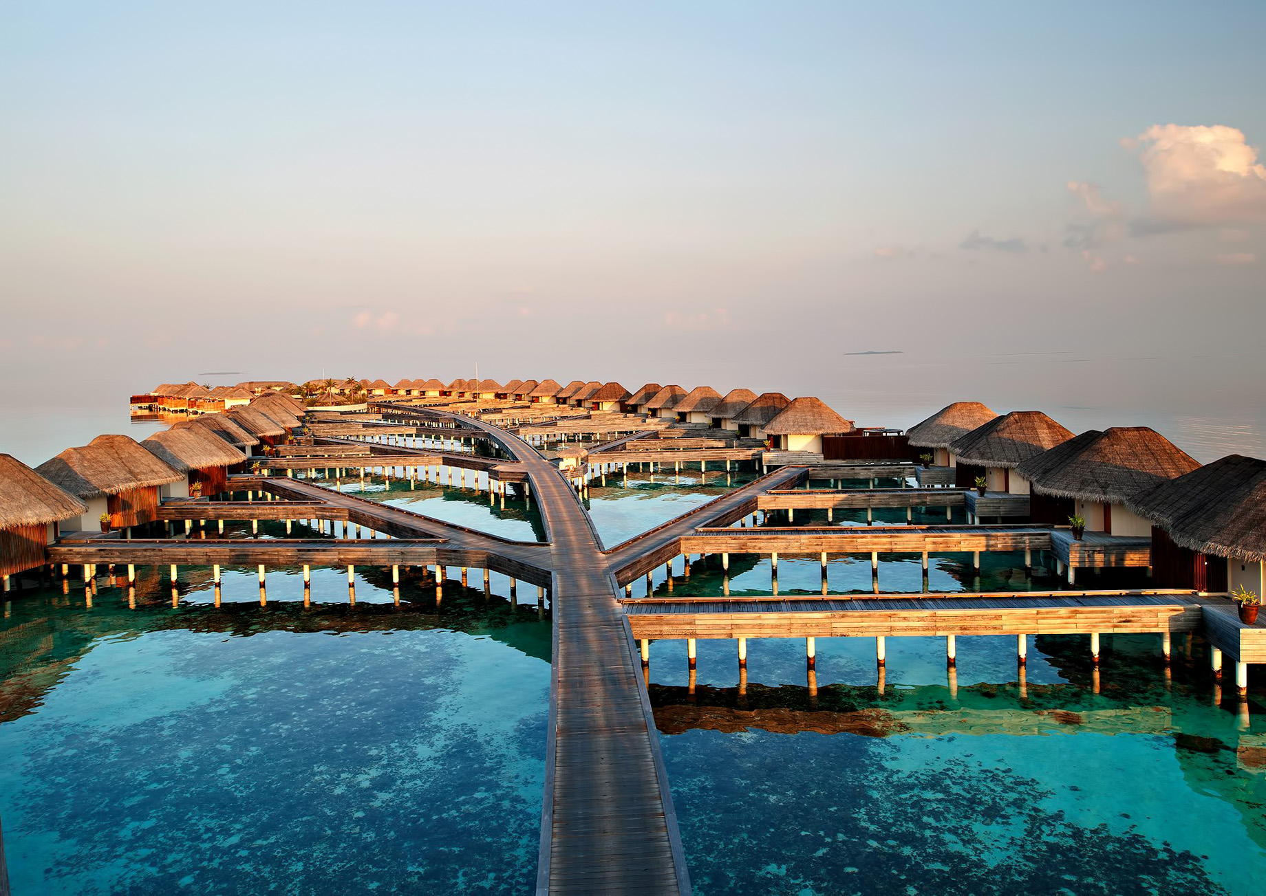 092 – W Maldives Resort – Fesdu Island, Maldives – Resort Overwater Bungalows Dusk View
