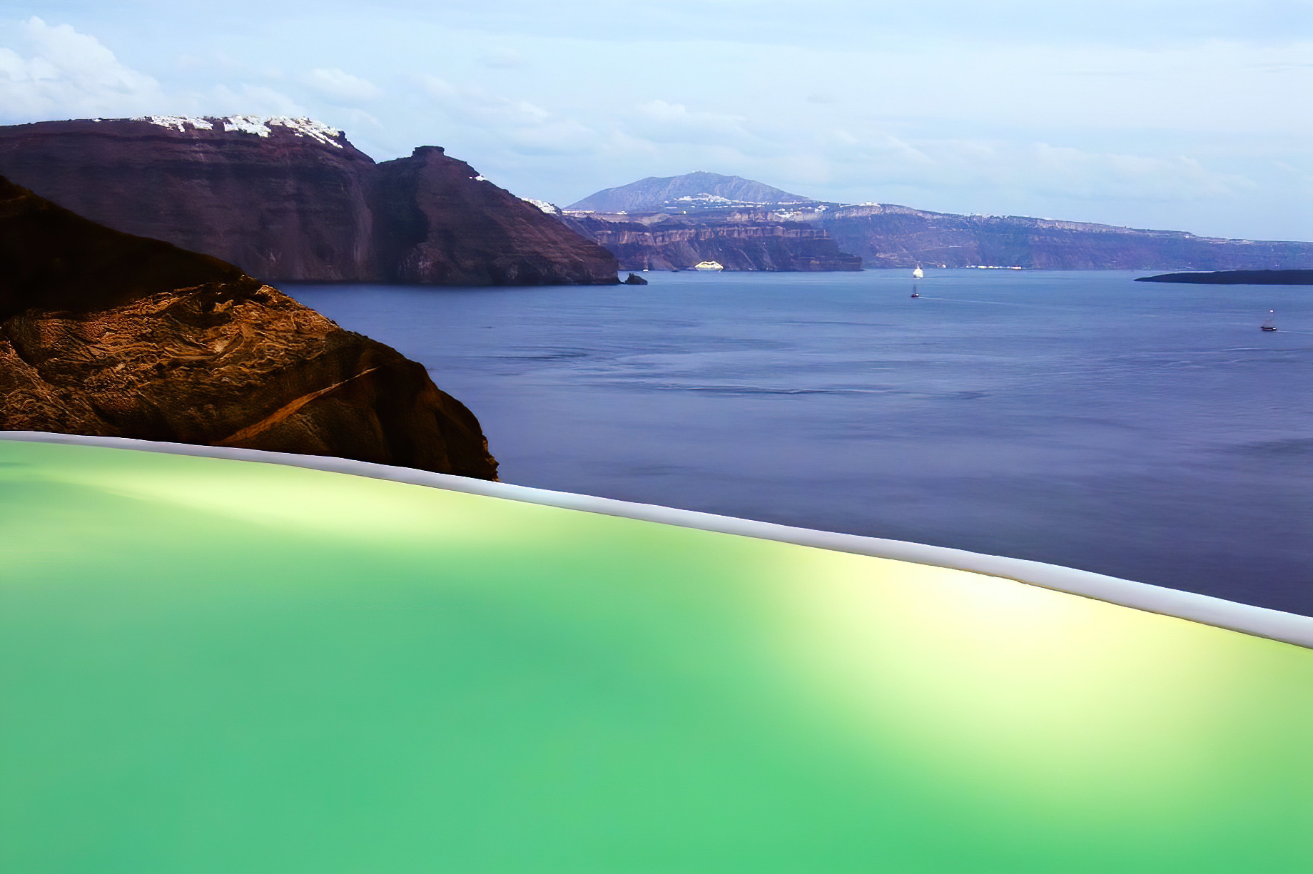 Mystique Hotel Santorini – Oia, Santorini Island, Greece – Ocean View Infinity Pool Sunset