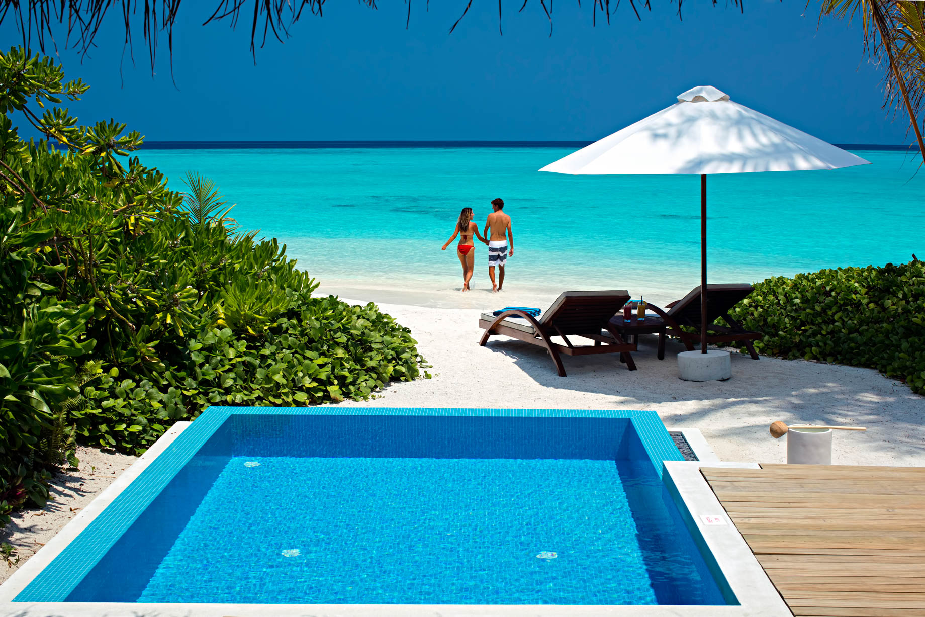 Velassaru Maldives Resort – South Male Atoll, Maldives – Beachfront Pool Chairs