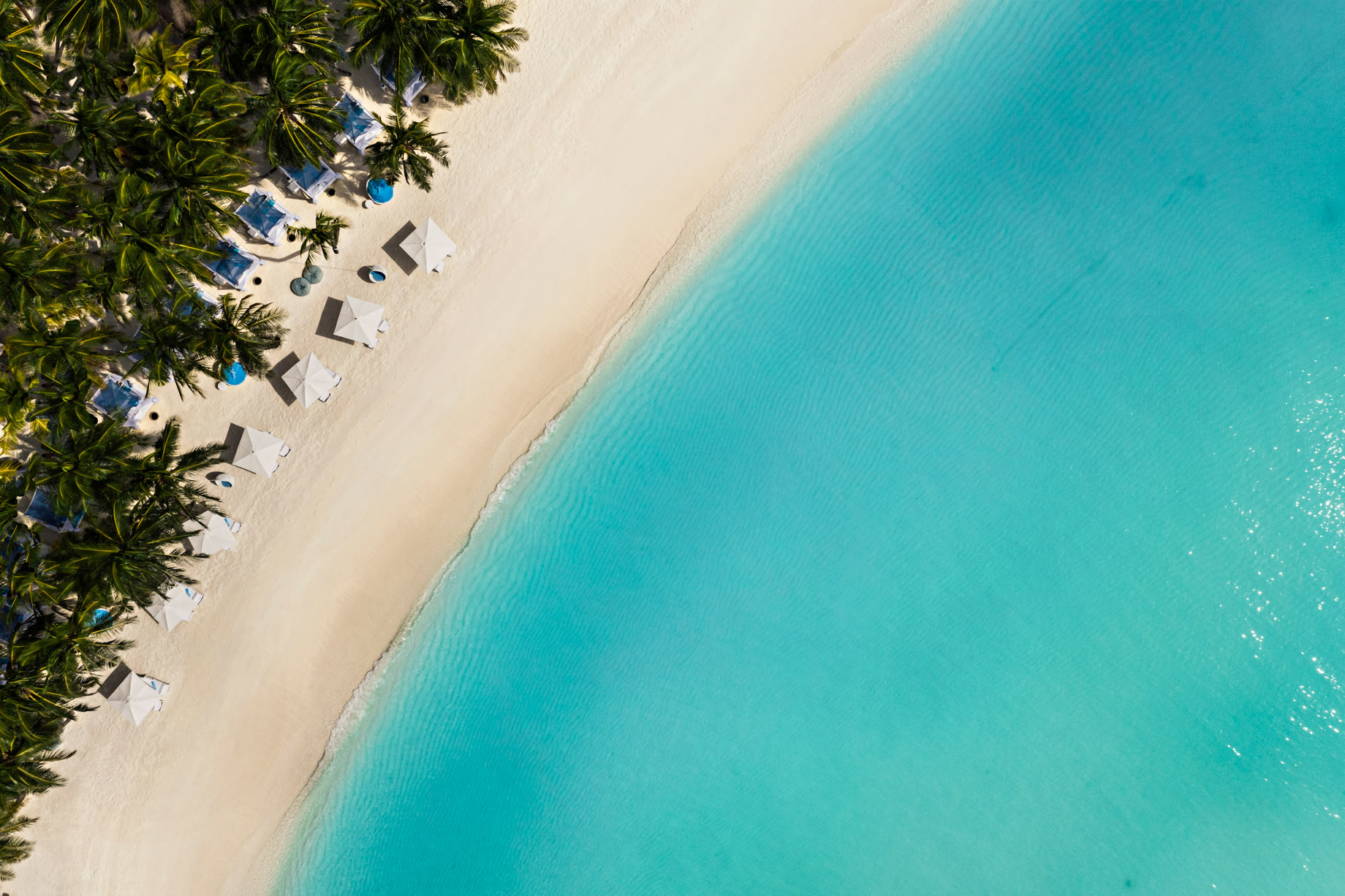 One&Only Reethi Rah Resort – North Male Atoll, Maldives – Beach Club Oceanfront Overhead Aerial