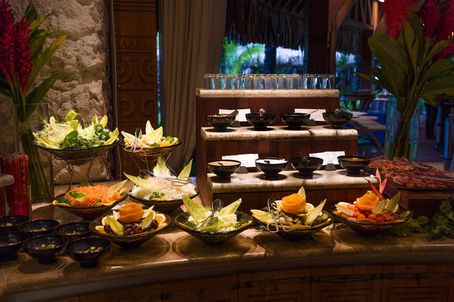 The St. Regis Bora Bora Resort - Bora Bora, French Polynesia - Te Pahu Polynesian Buffet Setup