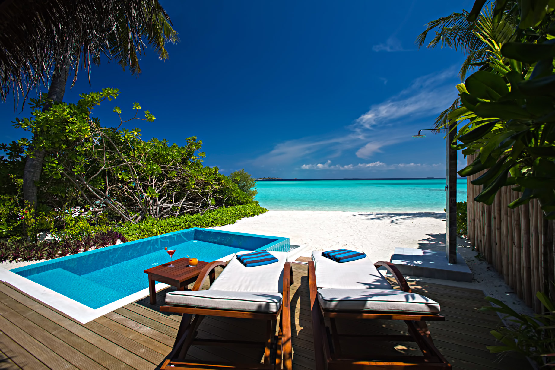 Velassaru Maldives Resort – South Male Atoll, Maldives – Beachfront Pool Chairs