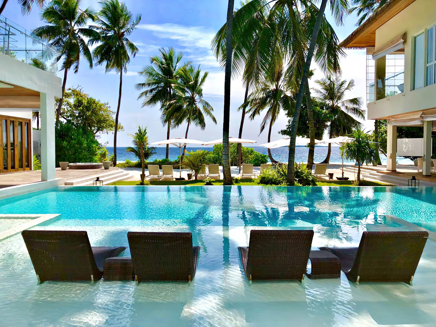 Amilla Fushi Resort and Residences – Baa Atoll, Maldives – Amilla Beach Estate Oceanfront Pool Water Chairs