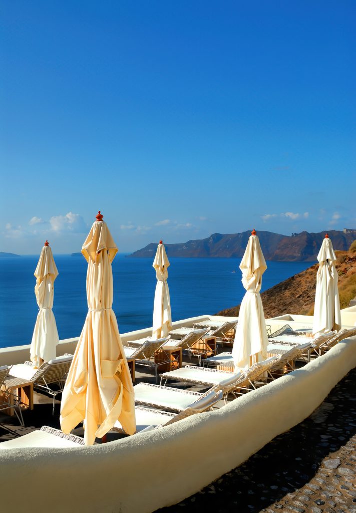 Mystique Hotel Santorini – Oia, Santorini Island, Greece - Ocean View Infinity Pool Deck Terrace