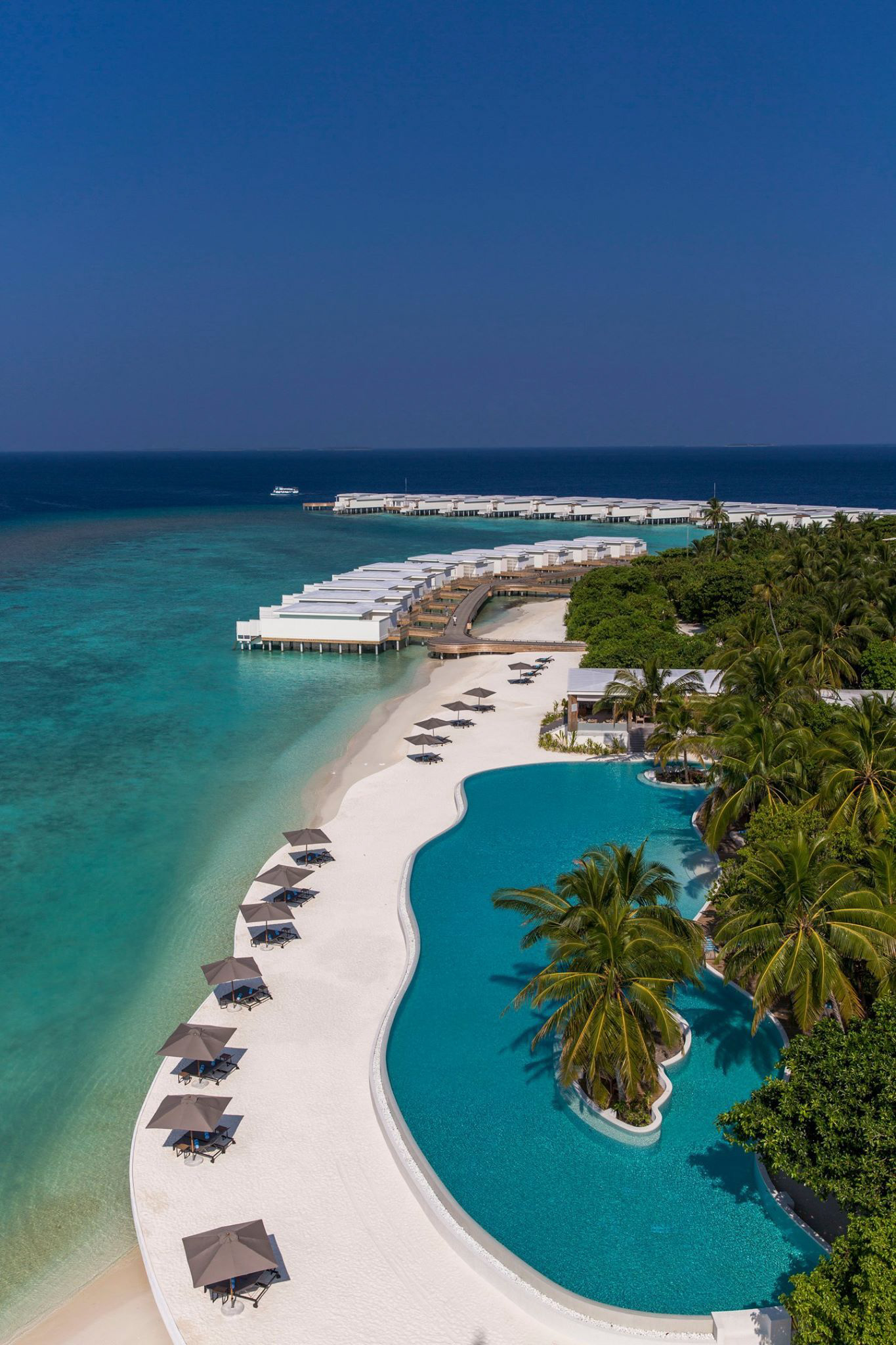 Amilla Fushi Resort and Residences – Baa Atoll, Maldives – Beachfront Pool Aerial
