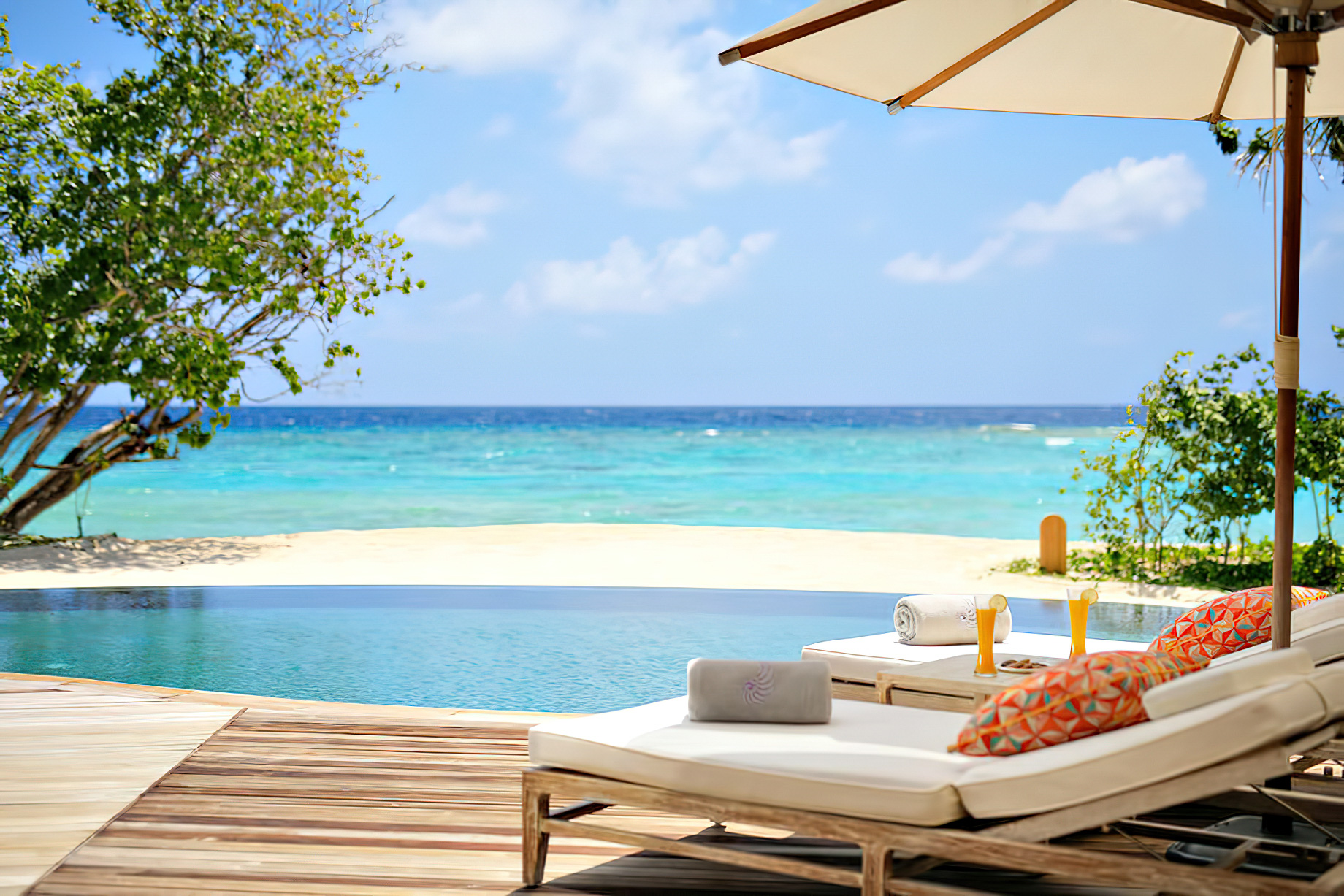 The Nautilus Maldives Resort - Thiladhoo Island, Maldives - White Sand Beach Pool Chairs
