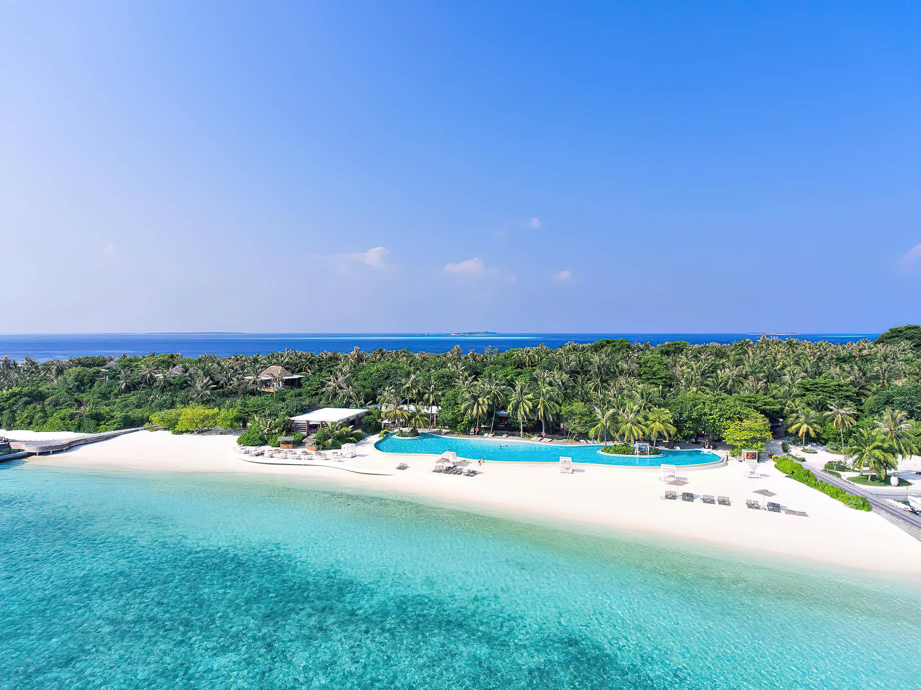 Amilla Fushi Resort and Residences – Baa Atoll, Maldives – Oceanfront Infinity Edge Pool Aerial
