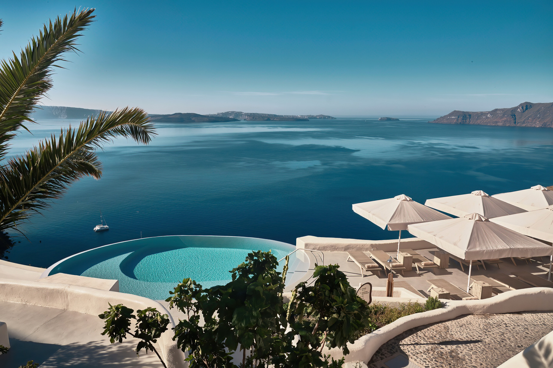 Mystique Hotel Santorini – Oia, Santorini Island, Greece – Clifftop Main Infinity Pool