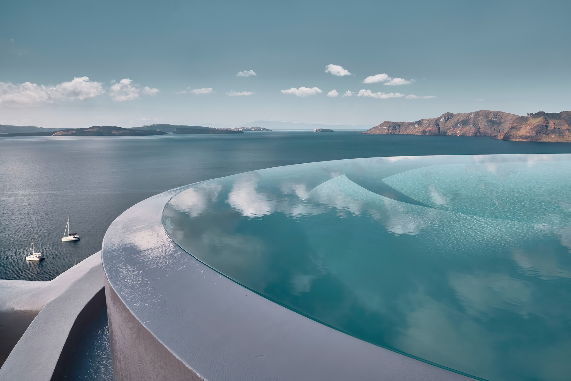Mystique Hotel Santorini – Oia, Santorini Island, Greece – Clifftop Infinity Pool Ocean View