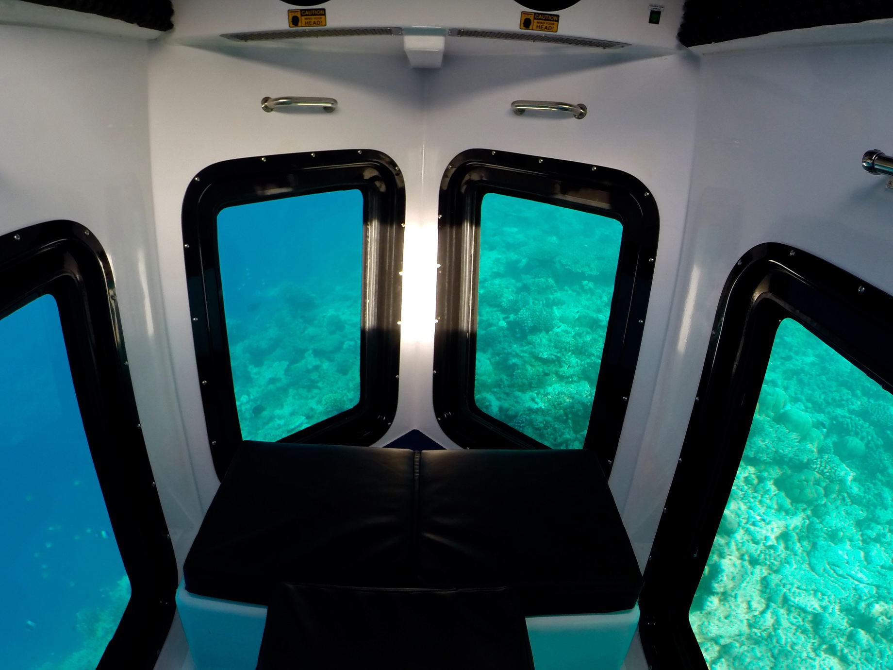 Amilla Fushi Resort and Residences - Baa Atoll, Maldives - Penguin Glass Bottom Boat Interior