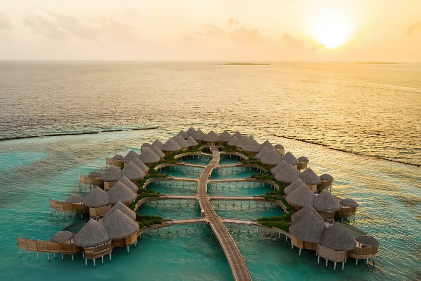 The Nautilus Maldives Resort - Thiladhoo Island, Maldives - Resort Aerial Sunset View