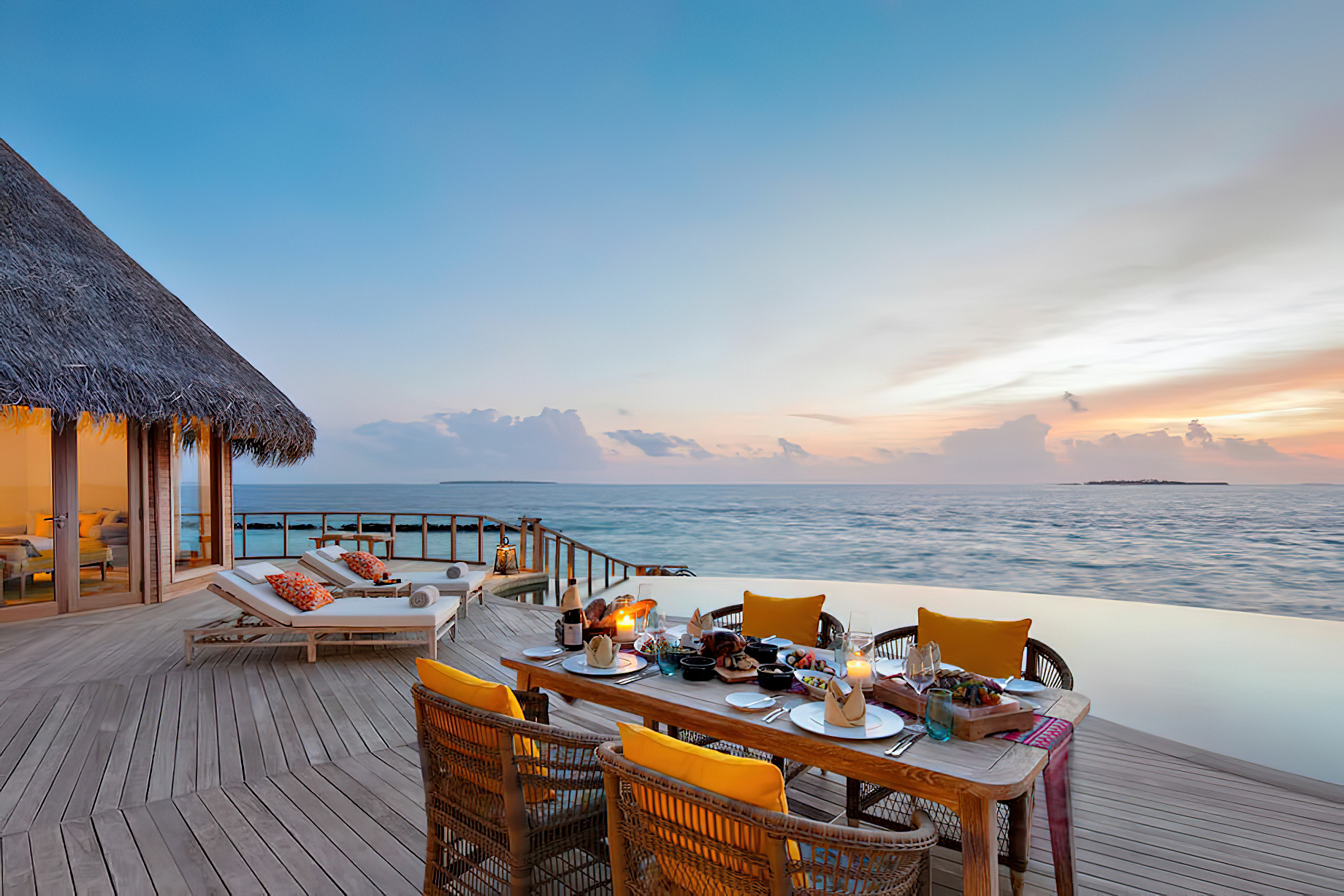 The Nautilus Maldives Resort - Thiladhoo Island, Maldives - Overwater Residence Pool Deck Sunset
