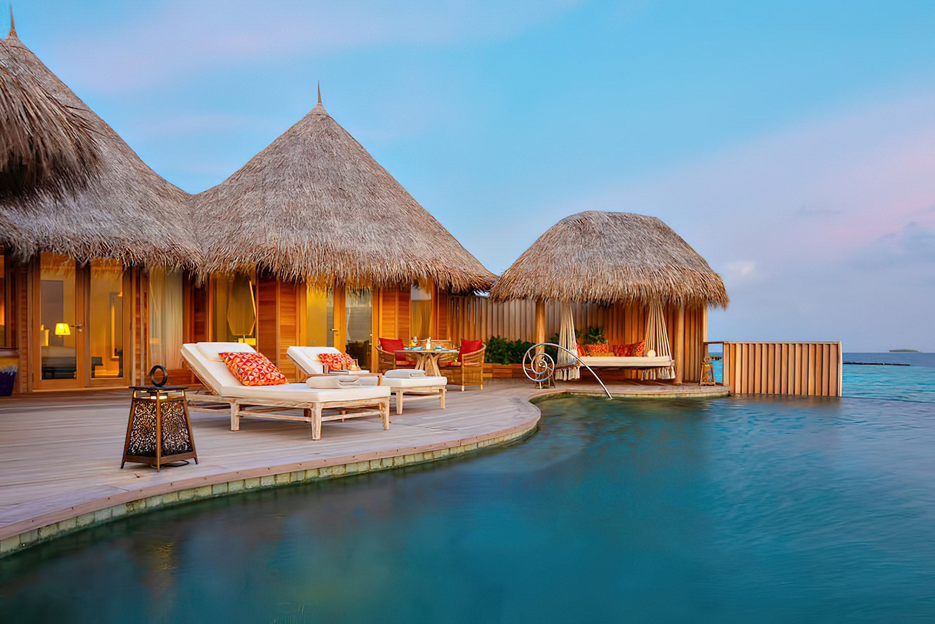 The Nautilus Maldives Resort - Thiladhoo Island, Maldives - Overwater Residence Pool Deck Sunset