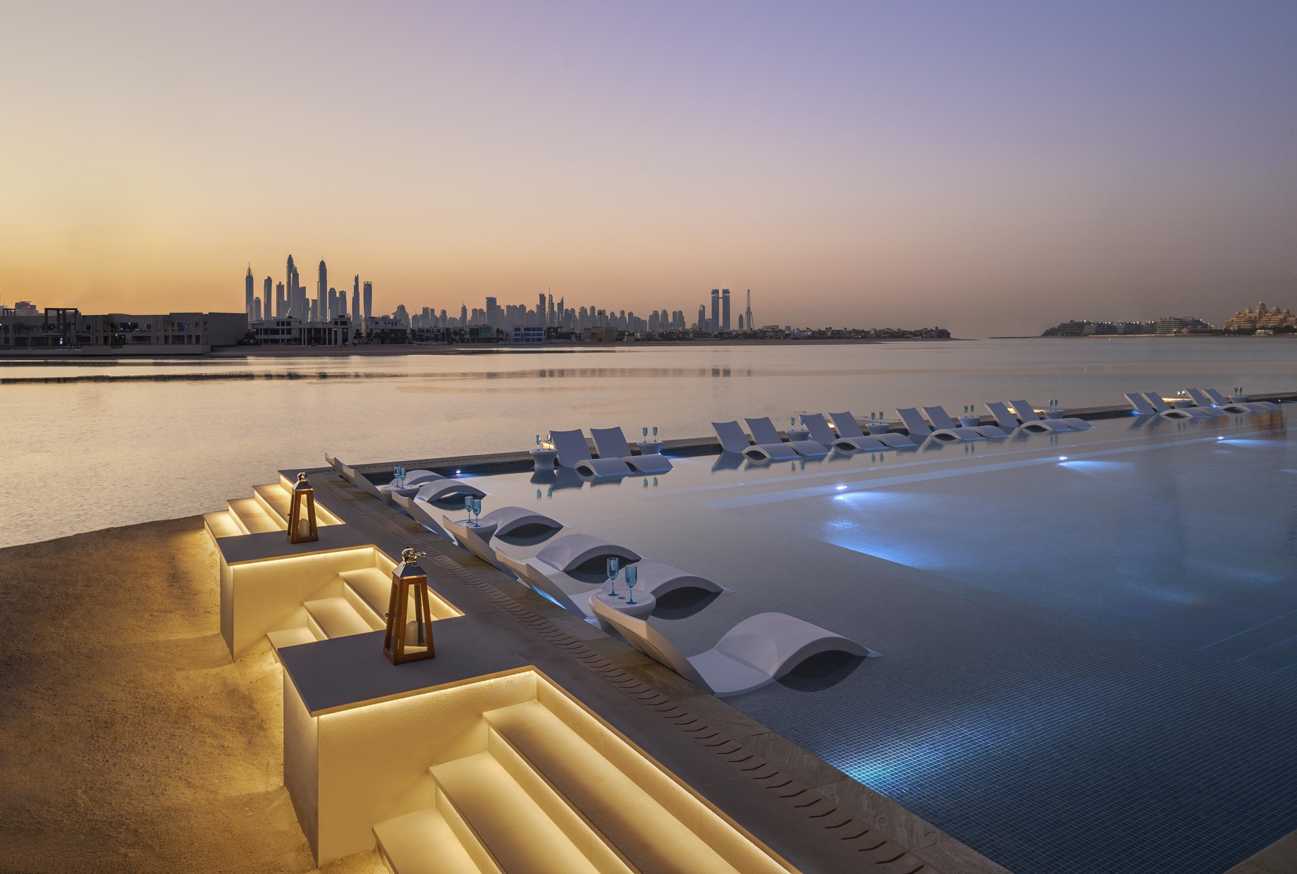 Atlantis The Palm Resort - Crescent Rd, Dubai, UAE - White Beach Club Pool Sunset