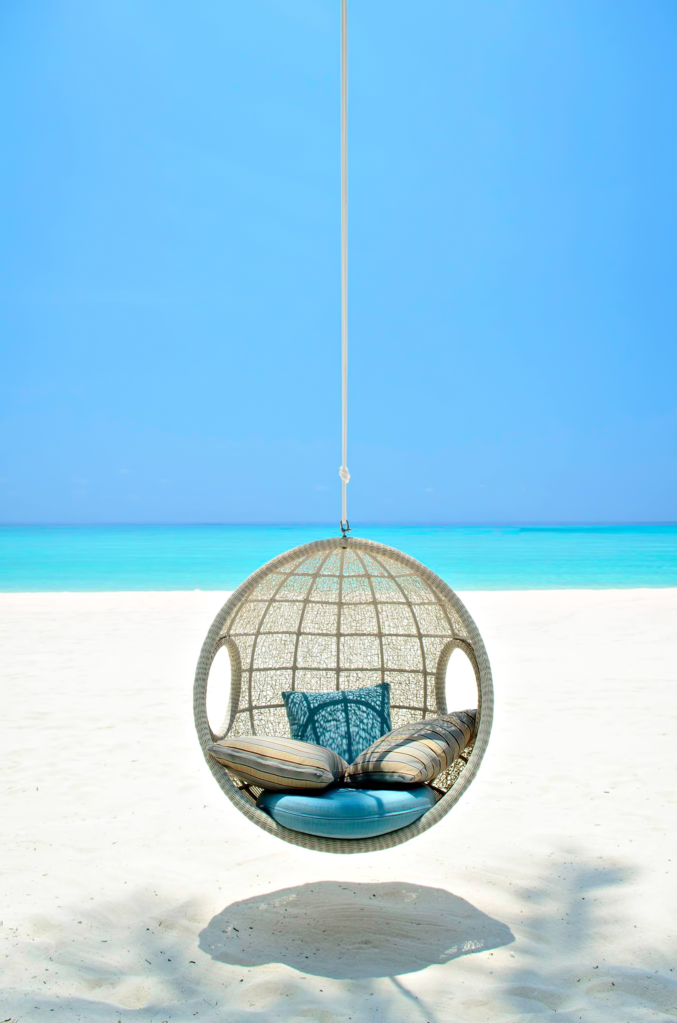 One&Only Reethi Rah Resort – North Male Atoll, Maldives – White Sand Beach Swing Chair