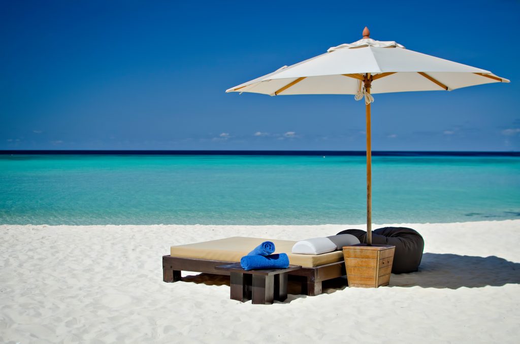 One&Only Reethi Rah Resort - North Male Atoll, Maldives - White Sand Beach Lounge Chair Sun Umbrella