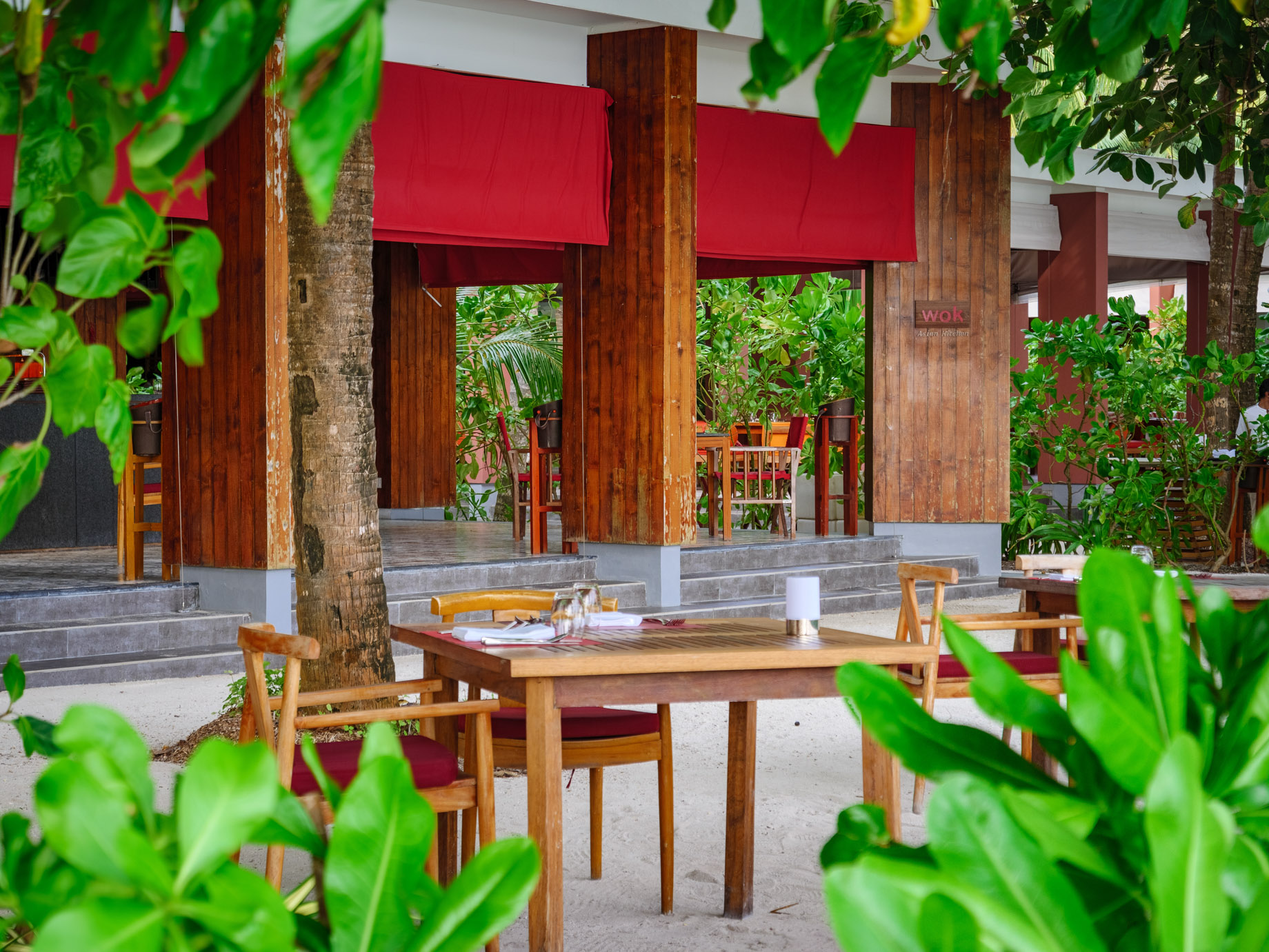 Amilla Fushi Resort and Residences – Baa Atoll, Maldives – EAST Restaurant Outdoor Table Seating