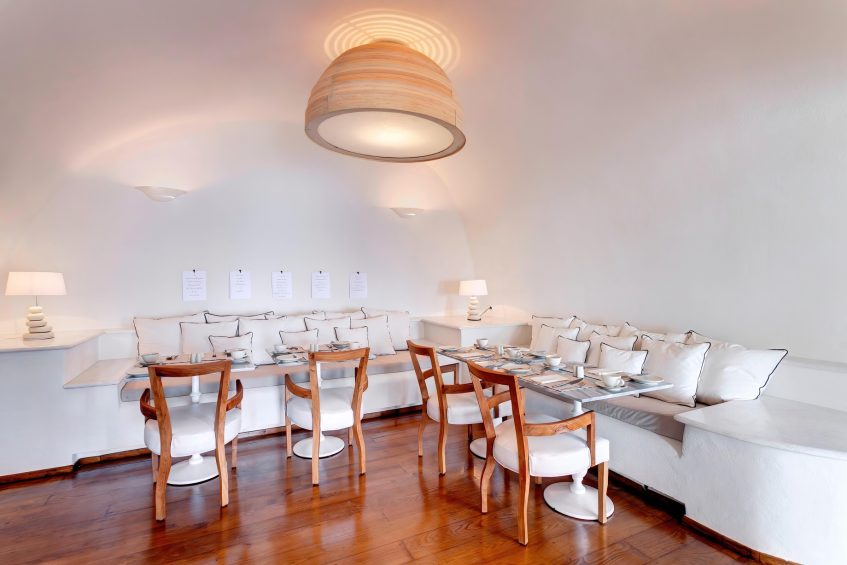 Mystique Hotel Santorini – Oia, Santorini Island, Greece - Captain's Lounge Tables