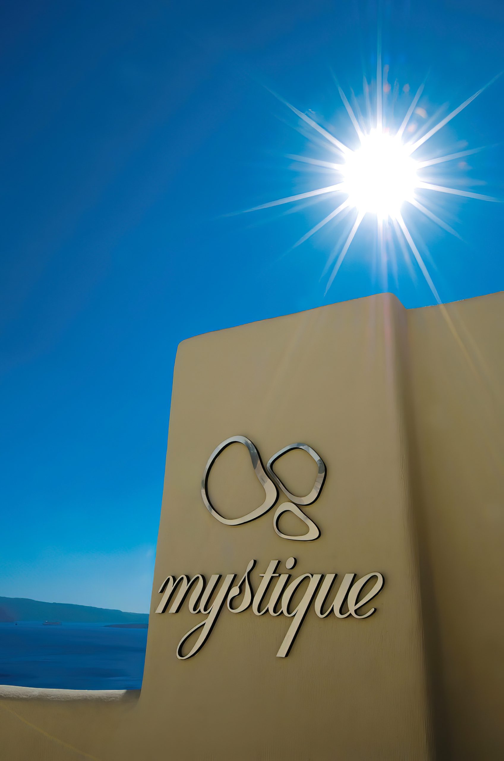 Mystique Hotel Santorini – Oia, Santorini Island, Greece - Mystique Sign