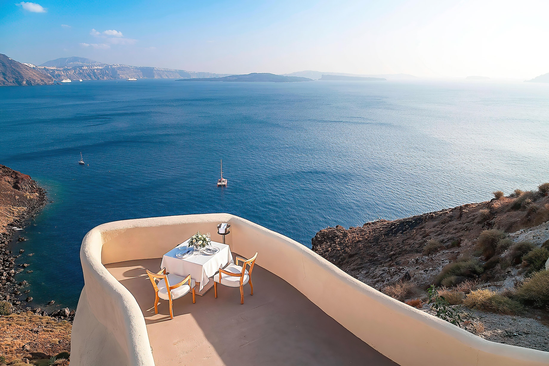 Mystique Hotel Santorini – Oia, Santorini Island, Greece – Private Dining Terrace with Sea View