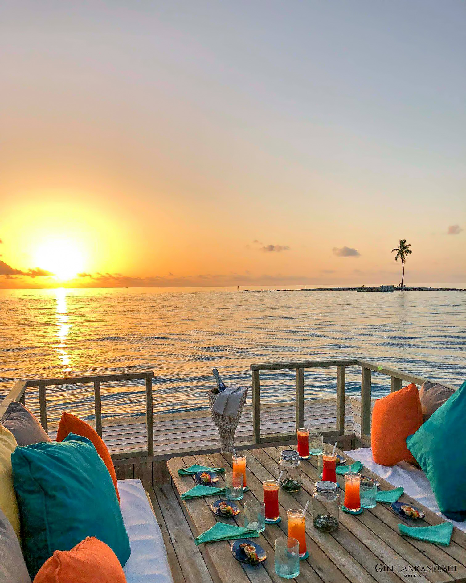 Gili Lankanfushi Resort – North Male Atoll, Maldives – Overwater Villa Outdoor Dining Lounge Sunset