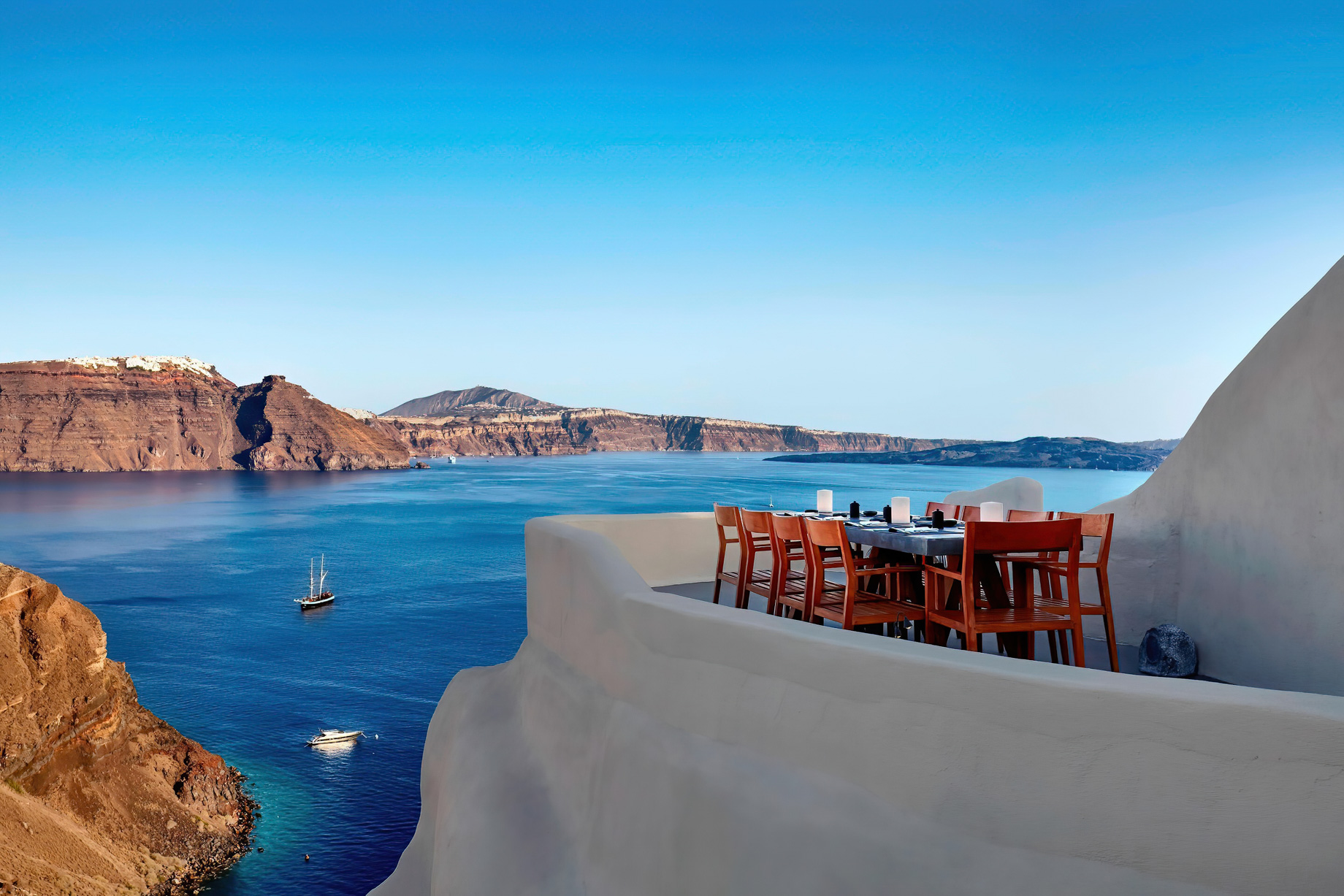 Mystique Hotel Santorini – Oia, Santorini Island, Greece - ASEA Restaurant Table Sea View