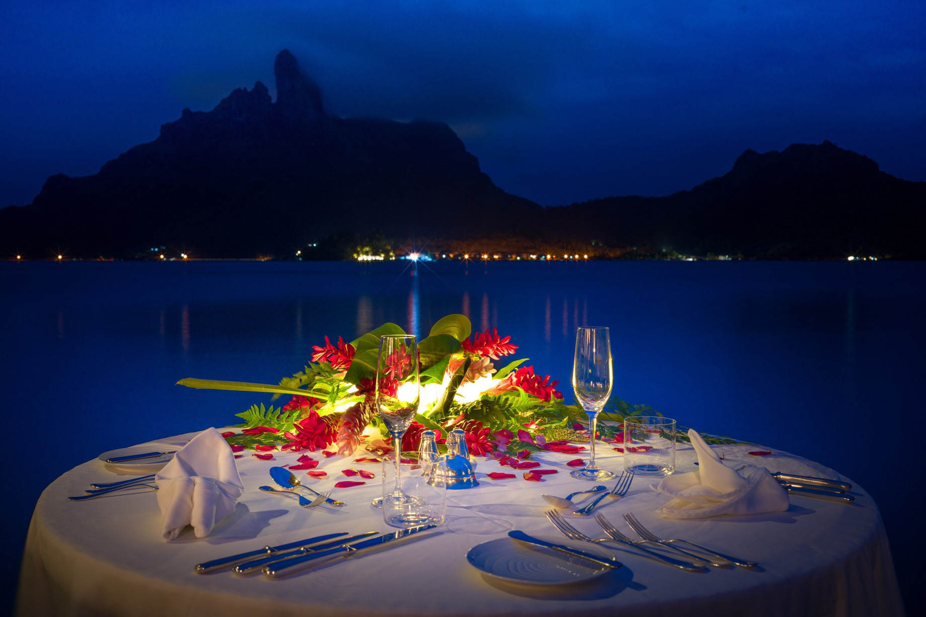 The St. Regis Bora Bora Resort – Bora Bora, French Polynesia – Candle Light Dinner Table at Night
