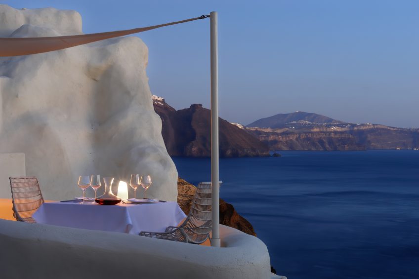 Mystique Hotel Santorini – Oia, Santorini Island, Greece - Cliffside Dining Table Ocean View