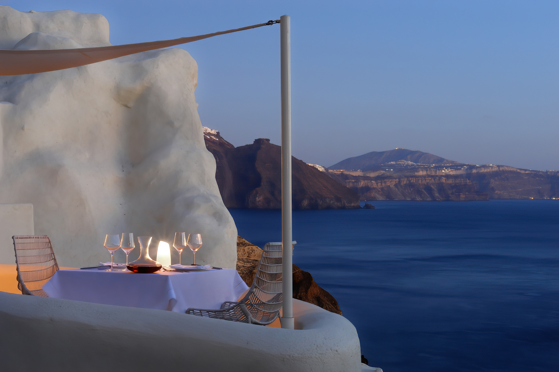Mystique Hotel Santorini – Oia, Santorini Island, Greece – Cliffside Dining Table Ocean View