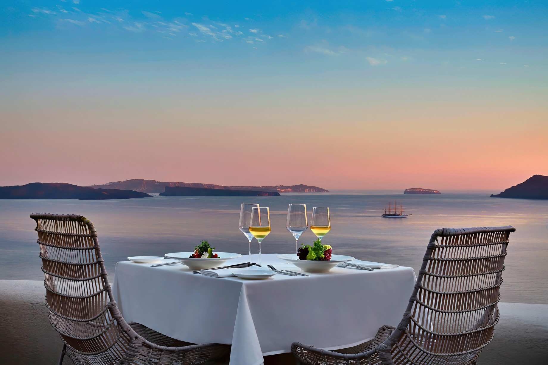 Mystique Hotel Santorini – Oia, Santorini Island, Greece – Cliffside Dining Table Sea View